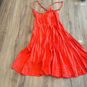 I’m selling a white short loose dress.